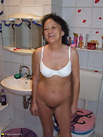 aged bitch caught changing raiment in the bath